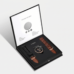 Watch set with two straps in a TOMI box on a light gray background
