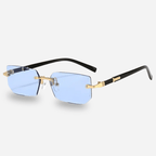 Sunglasses with black and gold frame on a white background