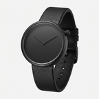 Black wristwatch with a leather strap on a white background
