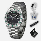 Silver watch with gemstone accents, ring, and other accessories on a white background