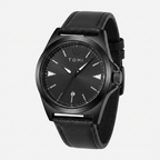 Black watch with leather strap on a white background