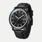 Person wearing a black watch with a blurred cityscape background