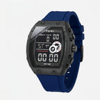 Digital watch with blue strap and black casing on a light gray background