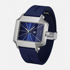 Watch with blue strap and silver case on a light gray background