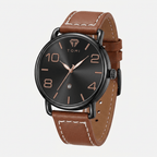 Watch with brown leather strap and black dial on a white background