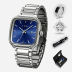 Silver watch with blue face and additional accessories on a white background