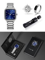 Collection of TOMI watches and accessories including a watch, ring, and black box with a watch on a gray background.