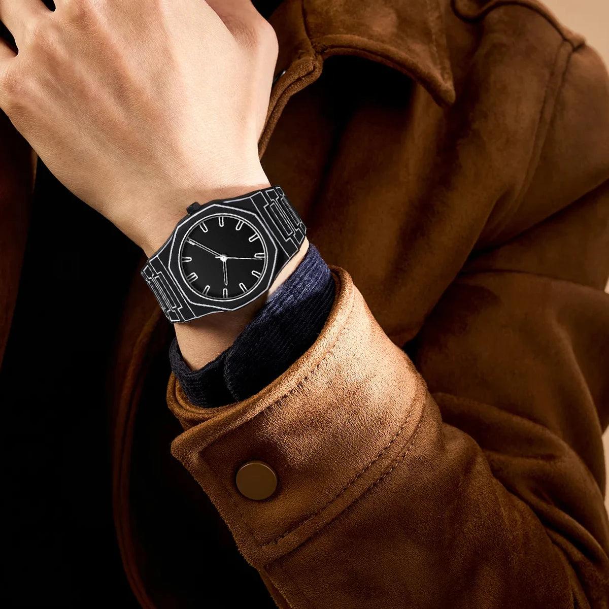 TOMI watch with octagonal case and geometric engraved steel bracelet, minimalist dial with baton hour markers and slim hands
