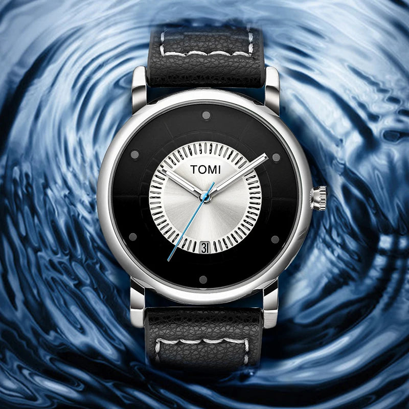 Watch with black leather strap and silver case on a blue swirling background
