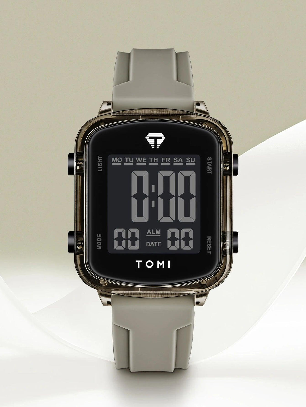Digital watch with a gray strap on a light background