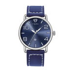 Blue watch with silver case and blue strap on a white background