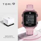 Digital watch with pink strap and TOMI branding on a white background