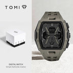 Tomi digital watch in an olive green and black rugged design, shown next to its white and black branded packaging box on a light gray background.