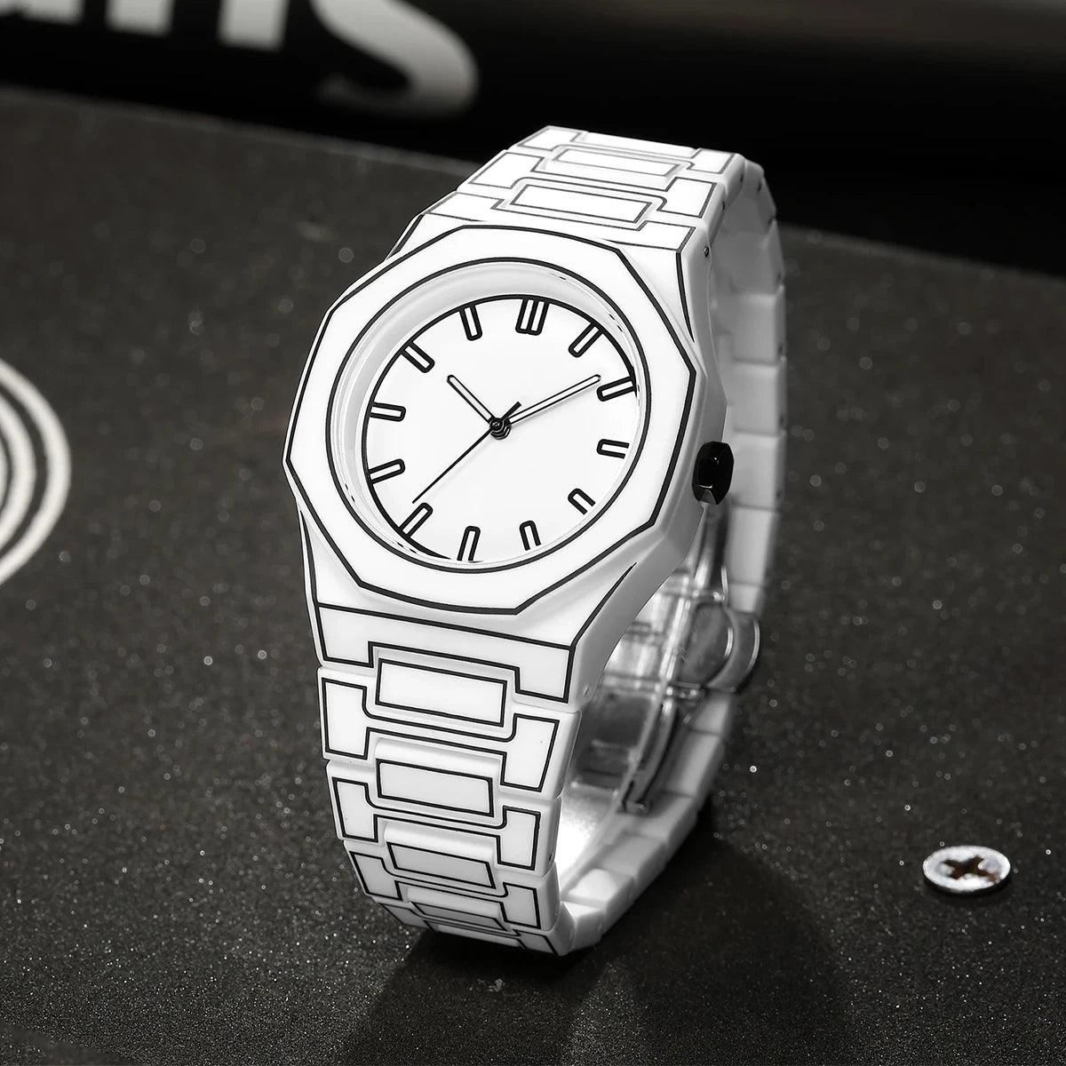 TOMI watch with octagonal case and geometric engraved steel bracelet, minimalist dial with baton hour markers and slim hands