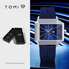 Blue watch with silver case and blue strap on a blue background, featuring the TOMI brand.