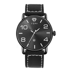 Black wristwatch with white stitching on a white background
