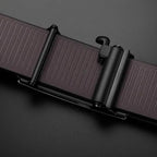 Brown leather belt with a black buckle on a dark gray background