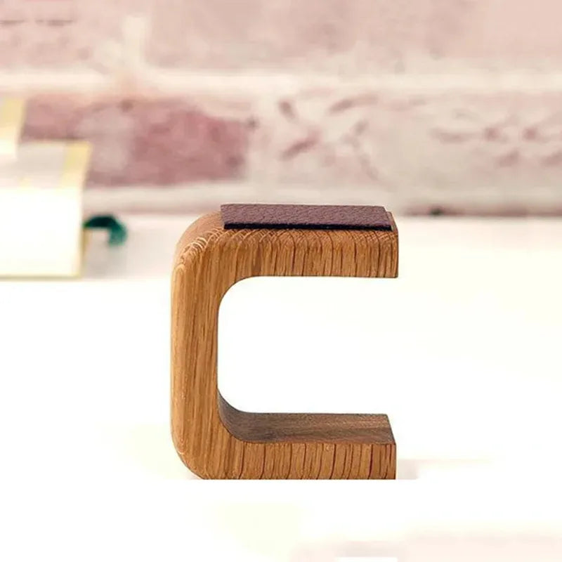 Wooden stool with a modern design on a blurred background