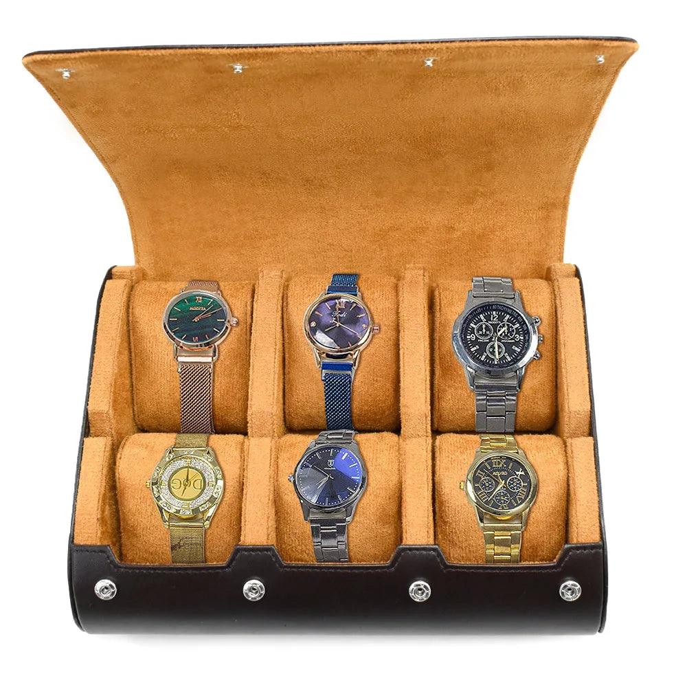 Set of five watches in a brown display case on a white background
