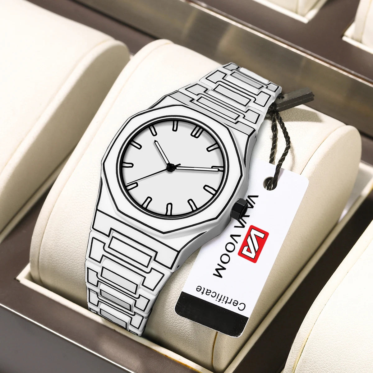 TOMI watch with octagonal case and geometric engraved steel bracelet, minimalist dial with baton hour markers and slim hands