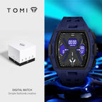 Tomi digital watch with a dark navy blue rugged strap and black textured case, shown alongside its white branded box on a split white and blue background.