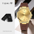 TOMI T051 gold-tone men's watch close-up, luxury dial