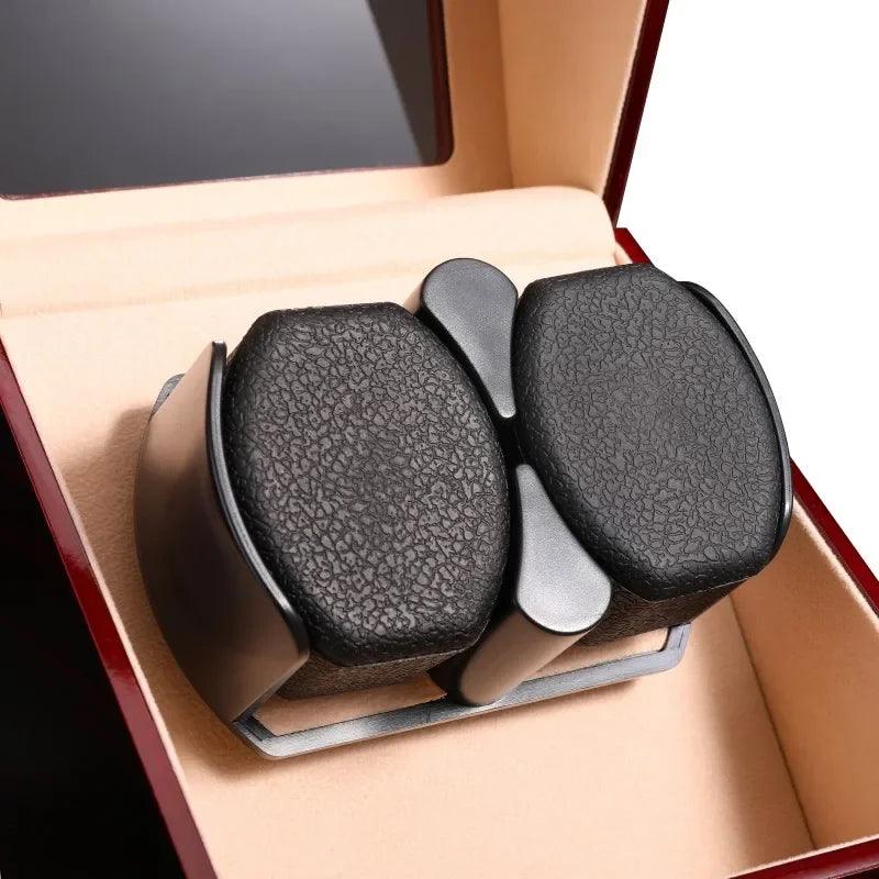 Black massage device with textured surface on a beige cushion