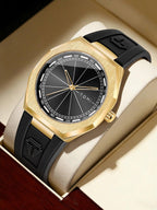 A luxury wristwatch by TOMI, featuring a brushed gold-tone case, a black dial with gold hands and markers, and a black rubber strap with a gold buckle, presented inside its cream-colored box.