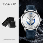 TOMI watch with blue strap and silver case on a space-themed background