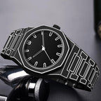 TOMI watch with octagonal case and geometric engraved steel bracelet, minimalist dial with baton hour markers and slim hands