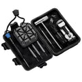 Set of tools in a black case on a white background