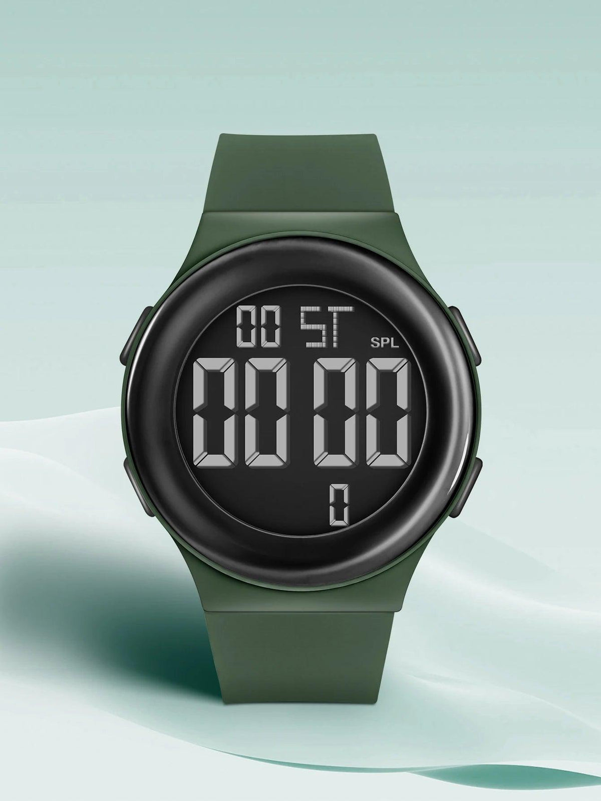 Green digital watch on a light green background
