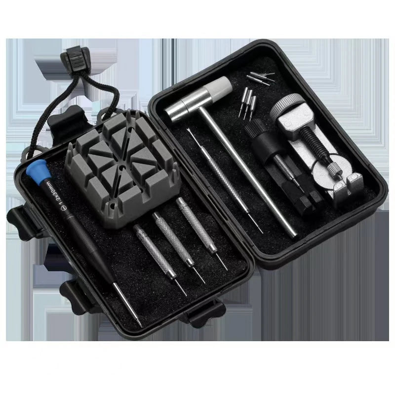 Set of tools in a black case on a white background