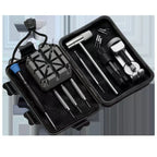 Set of tools in a black case on a white background