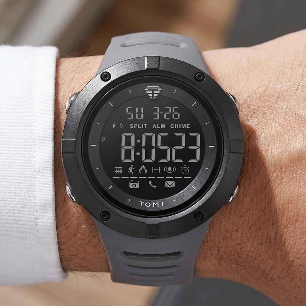 Man wearing TOMI T210 Bastion Thrust watch, Grey colorway