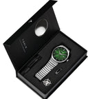 Green watch and pen set in a black box with TONI branding.