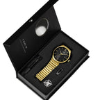Gold watch and pen set in a black box with 'TONA' branding.