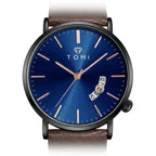 TOMI T018 Enigma Splendor watch with blue dial and brown leather strap, front studio view