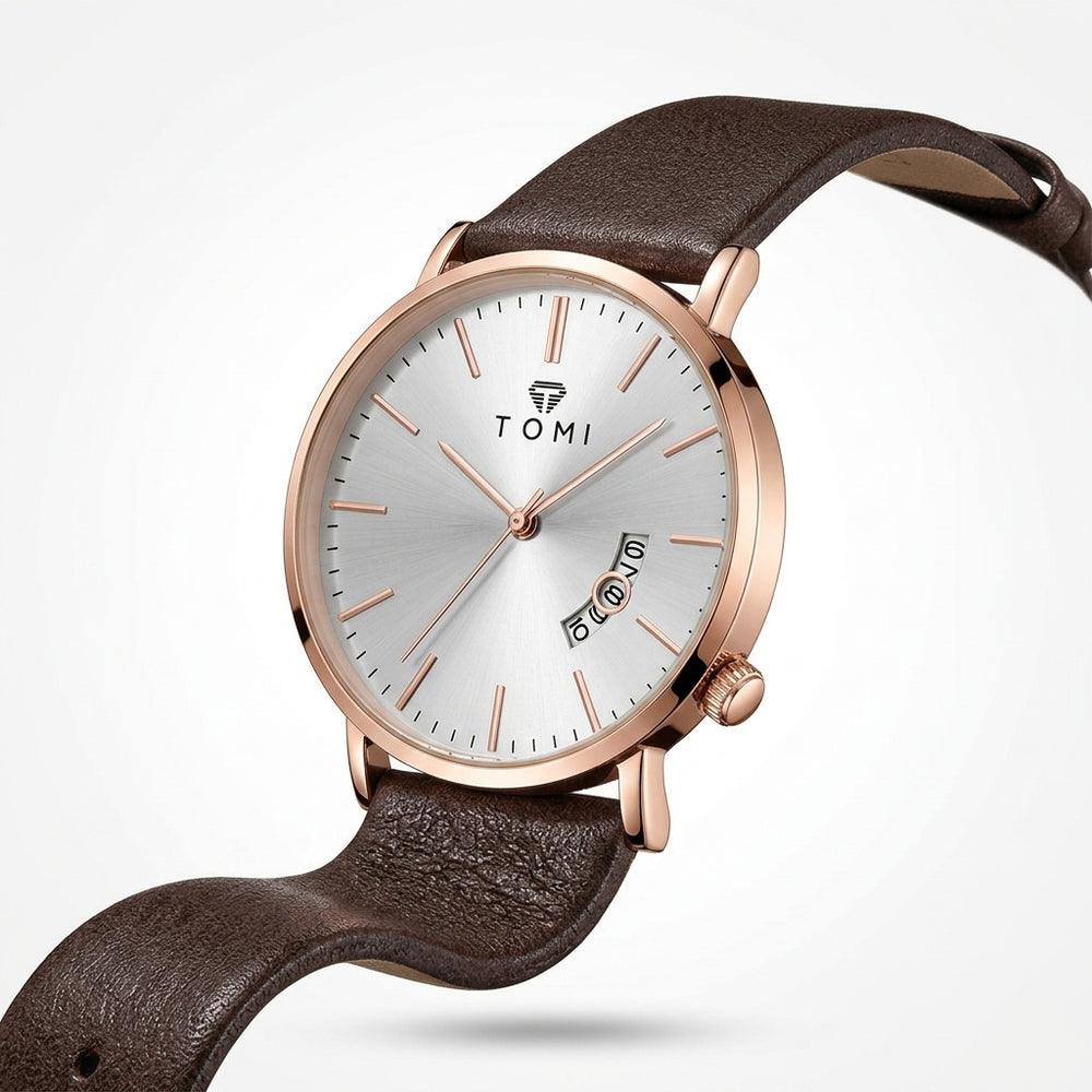 TOMI T018 Enigma Splendor watch with silver dial and brown leather strap, angled 3/4 view