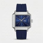 Blue watch with silver case and blue strap on a white background