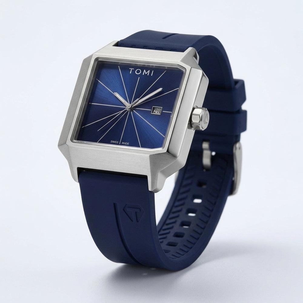 Blue watch with silver case and blue strap, angled view