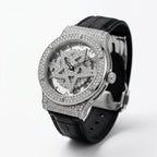 TOMI T029 Opulence Radiance watch with silver diamond-set case and black leather strap, angled 3/4 view