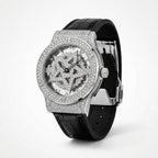 Man wearing TOMI T029 Opulence Radiance watch with silver diamond-set case and black leather strap, indoor sleeve view