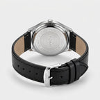 TOMI T030 Obsidian watch with silver case and black leather strap, back view