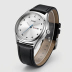 TOMI T030 Obsidian watch with silver case and black leather strap, angled 3/4 view