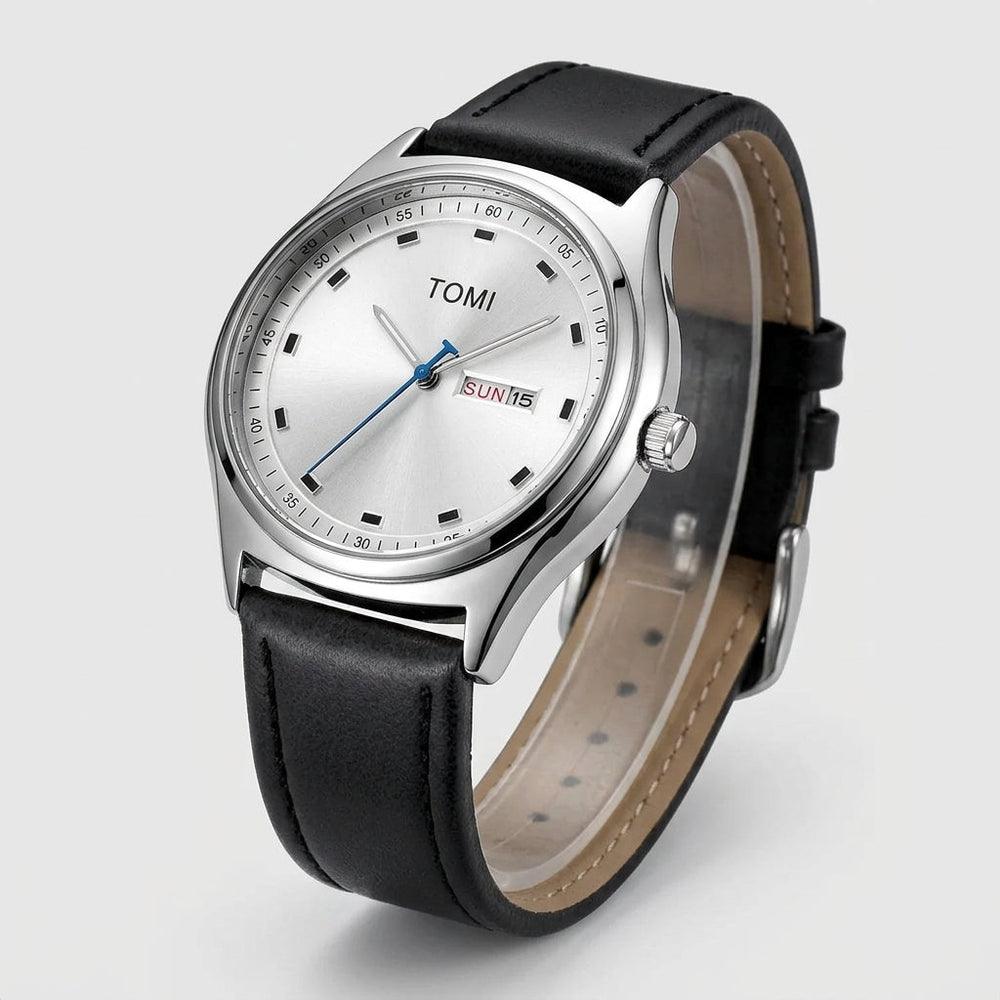 TOMI T030 Obsidian watch with silver case and black leather strap, angled 3/4 view
