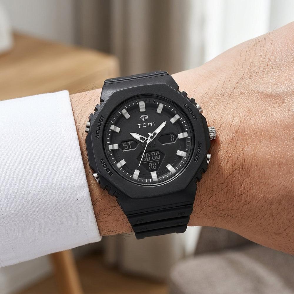 Man wearing TOMI T217 Citadel Noir all-black sport watch, close-up